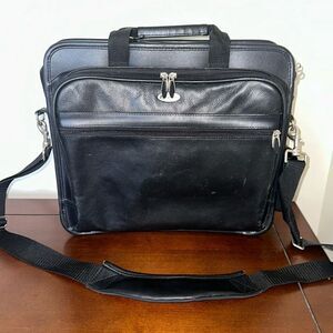 TARGUS Black Tech Padded Faux Leather Laptop Travel Bag with a Crossbody Strap